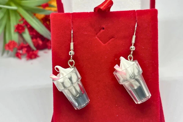The 7 Souvenir Trends for 2026 13 milk shake souvenir earring
